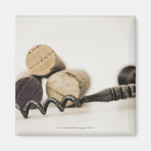 Wine corks with corkscrew magnet