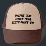 Wine 'em Dine 'em 69 'em Trucker Hat<br><div class="desc">This trucker hat was worn by SeaBass in the 90's cult classic movie Dumb & Dumber. Get your wine em dine em sixty nine em hat today!</div>