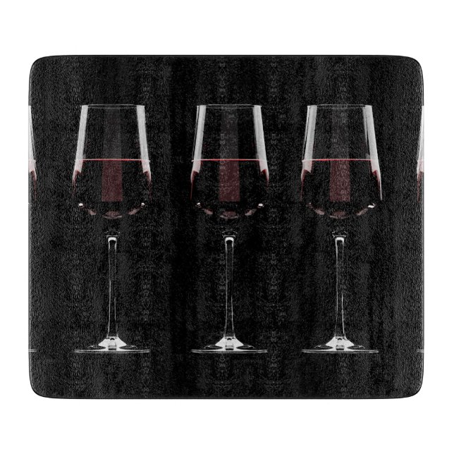 Wine glasses with red wine on black cutting board (Front)