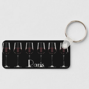 Wine glasses with red wine on black keychain