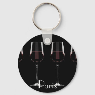 Wine glasses with red wine on black keychain