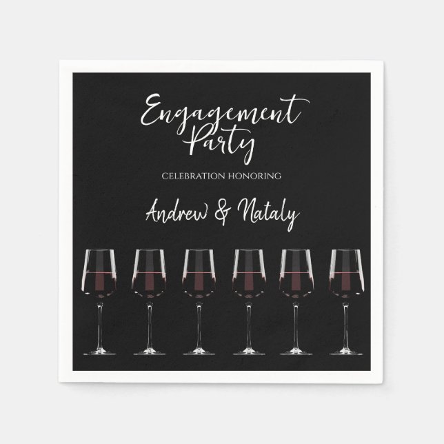 Wine glasses with red wine on black napkins (Front)