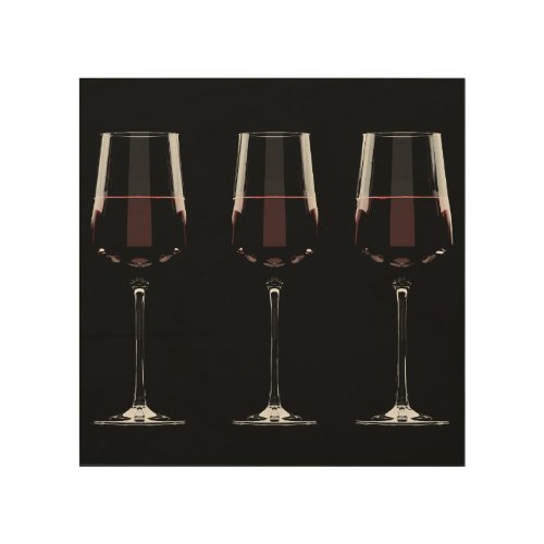Wine glasses with red wine on black wood wall art
