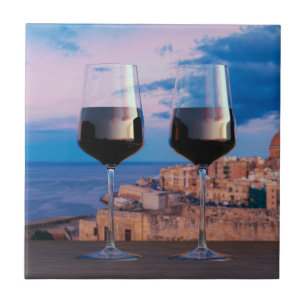 Wine glasses with view of sunset over Valletta Ceramic Tile