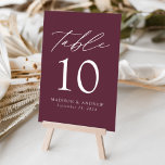Wine Modern Elegance Wedding Table Number<br><div class="desc">Trendy, minimalist wedding table number cards featuring white modern lettering with "Table" in a modern calligraphy script. The design features a wine purple background or color of your choice. The design repeats on the back. To order the table cards: add your name, wedding date, and table number. Add each number...</div>