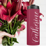 Wine Red Stylized Maid of Honor Name Thermal Tumbler<br><div class="desc">For your wedding Maid of Honor! Keep hot beverages hot and cold beverages cold with this insulated, metal thermal tumbler that is a trendy, wine red color along with Maid of Honor's name printed in white, stylized script. Edit your thermal tumbler and replace name with your own maid of honor...</div>