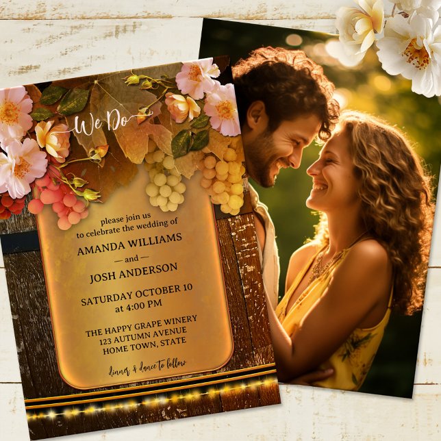 Wine Themed String Lights Photo Wedding Invitation (Wedding invitation featuring grapes and roses on a rustic wood wine barrel on gold and string lights)