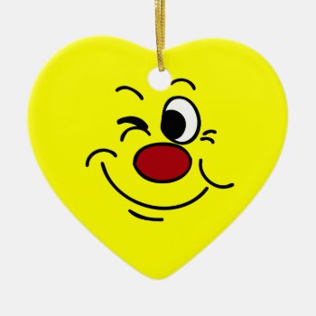 Winking Face Grumpey Ceramic Ornament by disgruntled_genius at Zazzle