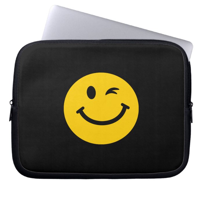 Winking smiley face laptop sleeve