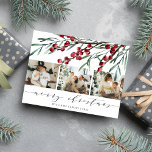 Winter Berry Script Christmas Three Photo Holiday Postcard<br><div class="desc">Greet your friends and loved ones a Merry Christmas this holiday season with this modern elegant postcard featuring watercolor winter berries,  botanical leaf stems,  three lovely photos of your family and a text you can personalize. (Placement photo by Elina Fairytale on Pexels. Kindly replace it with your own.)</div>