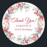 Winter Berry Wreath 80th Birthday Thank You Classic Round Sticker<br><div class="desc">A beautiful and elegant thank you favor sticker designed especially for an 80th birthday party. It features a watercolor wreath of red berries nestled in sage green foliage. Thank you is written in a timeless and classic script. Two lines below let you customize your thanks. This item is part of...</div>