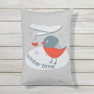 Winter bullfinch bird and red rowan berries outdoor pillow