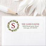 Winter Christmas Holly Wreath Monogram Red Label<br><div class="desc">Lovely festive stickers / seals/ labels return address hand painted watercolor holly in green and deep red berry colors with MONOGRAM / initial.  Easy to edit text.  HAPPY HOLIDAYS or MERRY CHRISTMAS.  Makes great seals to envelope to send to family and friends during the holiday season - great keepsake!</div>