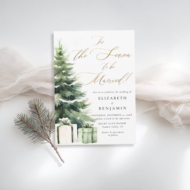 Christmas wedding invitation with majestic snowy pine tree and faux gold calligraphy reading Tis the Season to Be Married
