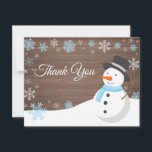 Winter Christmas Snowman Blue Thank You Card<br><div class="desc">Rustic Winter Christmas Snowman Snowflake Blue Thank You Card. Blue Polar Bear. Rustic Wood Background. Country Vintage Retro Barn. Blue Snowflake. Love and Thanks, beautiful script font. Add your message on back or leave blank and hand write. For further customization, please click the "Customize it" button and use our design...</div>