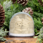 Winter Fox Couple in Cozy Knit Hats Snow Globe<br><div class="desc">Celebrate the magic of winter with this charming snow globe featuring two adorable foxes bundled up in cozy knit hats and scarves. Perfect as a heartwarming Christmas gift, nursery decor, or a seasonal accent for any room, this design radiates warmth, innocence, and timeless charm. A delightful keepsake for animal lovers...</div>