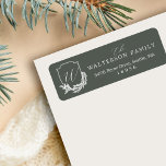 Winter Garland Calligraphy Script Monogram Crest Label<br><div class="desc">Embrace the joy of the holiday season with our winter garland monogram crest holiday return address label. Our personalized return address label features our winter garland monogram crest design. Customize with family signature, address, and monogram. Spread the love and cheer this winter with these stunning return address labels. Design by...</div>