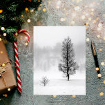 Winter landscape snow tree fog birch postcard<br><div class="desc">Winter landscape with snow and fog.  In front a small birch tree and back a bigger tree.  An almost black and white photo,  but natural colors because of the snow and the fog.</div>