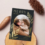 Winter Laurel | Merry Christmas Photo Foil Holiday Card<br><div class="desc">A chic and elegant holiday card design featuring a single vertical or portrait-oriented photo in a unique arched layout, embellished with finely detailed botanical foliage in gold foil. "Merry Christmas" appears at the top left, with your family name at the lower right. A refined nature-inspired choice for your Christmas 2022...</div>