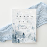 Winter Reverie Wedding Invitation<br><div class="desc">Elegant winter wedding invitation features a watercolor background depicting a snowy mountain landscape dotted with pine trees in misty shades of blue and gray. Personalize with your wedding details in chic soft off-black lettering. A beautiful choice for elegant winter weddings in mountain or forest settings. Alternate layouts available in our...</div>