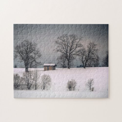 Winter scene hill and trees hut jigsaw puzzle