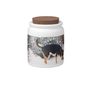 Winter snow scene with cute black and tan dog candy jar