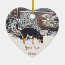 winter snow scene with cute black and tan dog