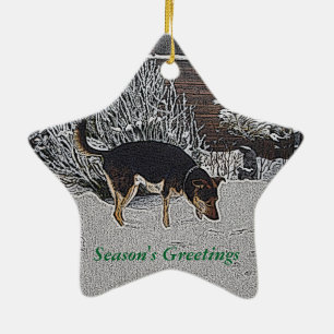 winter snow scene with cute black and tan dog ceramic ornament