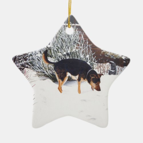 Winter snow scene with cute black and tan dog ceramic ornament