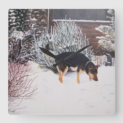 Winter snow scene with cute black and tan dog square wall clock