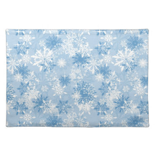Winter snowflakes pattern on blue cloth placemat