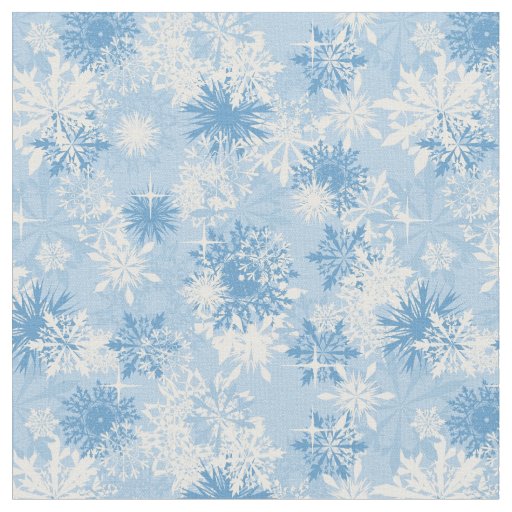 Winter snowflakes pattern on blue fabric