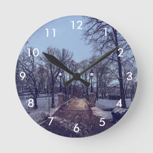 Winter snowy city park in the evening round clock