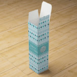 Winter Trees and Snowflakes Blue Pattern Wine Box<br><div class="desc">Winter pattern with rows of pine trees and snowflakes with a teal band on personalized light blue Christmas wine gift box.  **Template text on front and back to change for your own message**</div>