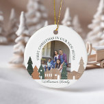 Winter Village Woodgrain First Christmas Photo Ceramic Ornament<br><div class="desc">Our natural cozy village Christmas ornament captures the true nature of the simple things. Natural textures of woodgrains, soft earth tones with beige, greys, and light ceramic creams create a clean, minimal, and cozy design. We've incorporated our hand-drawn woodgrain village and forest trees. Customize with your family photo in the...</div>