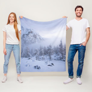 Winter wonderland, fog, spruce forest and mountain fleece blanket