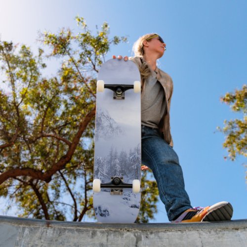 Winter wonderland fog spruce forest and mountain skateboard