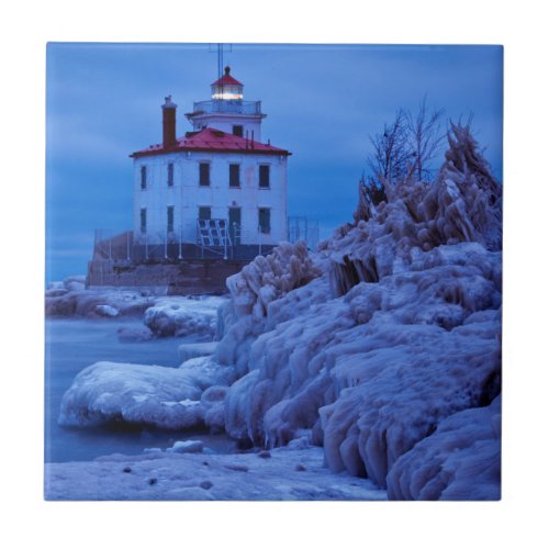 Wintry Icy Night At Fairport Harbor Lighthouse Ceramic Tile
