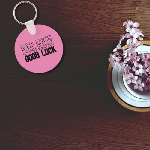 Wisdom saying Good luck often brings pink black Keychain