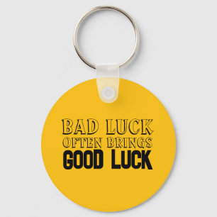 Wisdom saying Good luck often brings yellow black Keychain