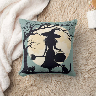 Witch brewing potions under the full moonlight throw pillow