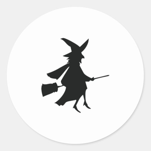 Witch flying on a broom classic round sticker
