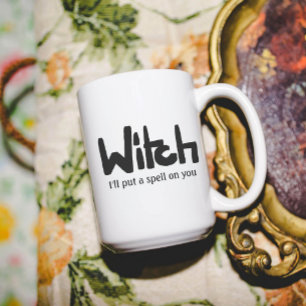 Witch in hand-lettered black ink saying coffee mug