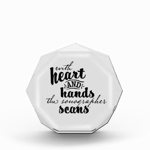 With Heart and Hands the Sonographer Scans Photo Block