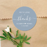 With Love And Thanks Dusty Blue Wedding Thank You Classic Round Sticker<br><div class="desc">Chic dusty blue thank you sticker for your wedding reception favors and thank you cards featuring "With Love   Thanks" in simple white typography and an elegant white script with swashes,  your first names joined together by a heart and your wedding date.</div>