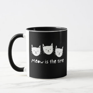 With te quote "Meow is the time" Mug