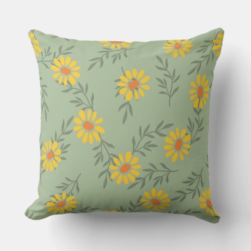With yellow daisies and soft green leaves throw pillow