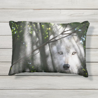 Wolf face in a sunbeam outdoor pillow