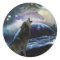 Wolf howling at the moon