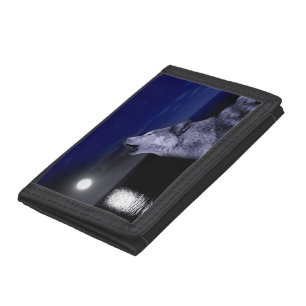 Wolf howling at the moon in the sea tri-fold wallet